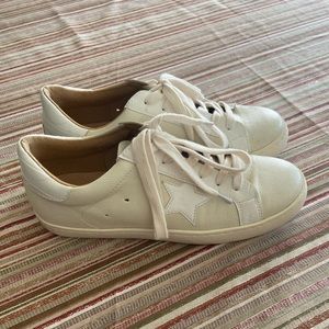 White Raven cream and white star sneakers